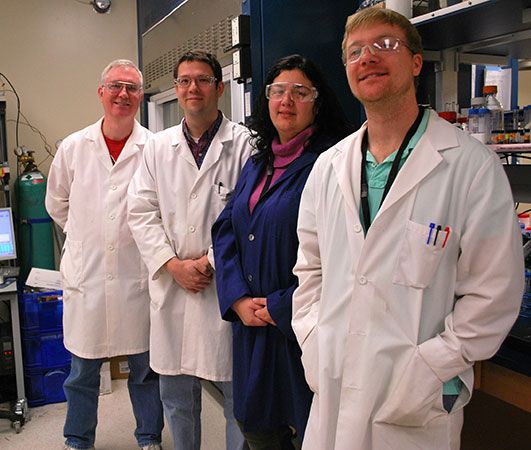 Army Research Lab Biotechnology team members David Mackie (left), James Sumner, Dimitra Stratis-Cullum and ICB-Caltech post doctoral researcher Matthew Coppock (right) work together with academic counterparts in Jim Heath's Caltech laboratory to shape basic research into projects that could have useful applications. Image courtesy of U.S. Army Research Laboratory. Group Photo