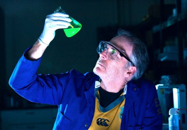 Professor Craig Hawker examines a novel chemiluminescence system. Photo: Matt Perko. Craig Hawker